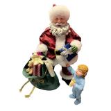 Possible Dreams Clothtique Santa with Gift Bag and Child Figure