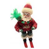 Vintage Santa Claus Figurine on Skis with Festive Sweater