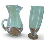 Collection of Vintage Cut Glassware Including Decanter, Pitchers, and Shade Covers