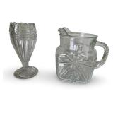 Collection of Vintage Cut Glassware Including Decanter, Pitchers, and Shade Covers