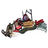Collection of Christmas Decor Items Including Santa Figure, Chairs, Sleighs, and Holiday Sign