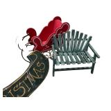 Collection of Christmas Decor Items Including Santa Figure, Chairs, Sleighs, and Holiday Sign
