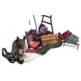 Collection of Christmas Decor Items Including Santa Figure, Chairs, Sleighs, and Holiday Sign