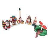 Collection of Wooden and Decorative Christmas Santa Figures with Reindeer