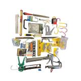 Assorted Hand Tools and Hardware Collection with Levels, Saws, Brackets, and Caulking Guns