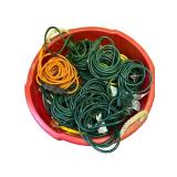 Large Collection of Assorted Extension Cords in Red Tub