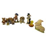 Collection of Ceramic Figurines Including Bears, Dog, Cartoon Characters, and Lambs