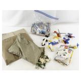 Collection of Desert Storm Trading Cards, Vintage Puzzle Pieces, and LEGO Vehicles