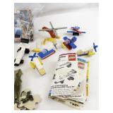 Collection of Desert Storm Trading Cards, Vintage Puzzle Pieces, and LEGO Vehicles