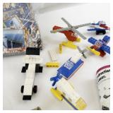 Collection of Desert Storm Trading Cards, Vintage Puzzle Pieces, and LEGO Vehicles