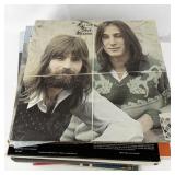 Collection of Vintage Vinyl Records and Illustrated LPs