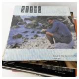 Collection of Vintage Vinyl Records and Illustrated LPs