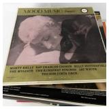 Collection of Vintage Vinyl Records and Illustrated LPs