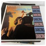 Collection of Vintage Vinyl Records and Illustrated LPs