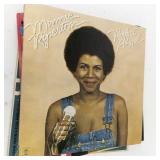 Collection of Vintage Vinyl Records and Illustrated LPs
