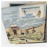 Collection of Vintage Vinyl Records and Illustrated LPs