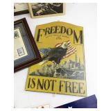 Collection of Military and Patriotic Memorabilia with WWII Stamps, Newspapers, and Signs