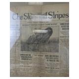 Collection of Military and Patriotic Memorabilia with WWII Stamps, Newspapers, and Signs