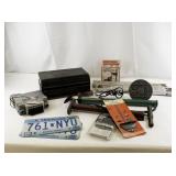 Automotive and Garage Tool Lot with Tire Chains, License Plates, Pumps, and Accessories