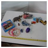 Unique set of playful dolls and figurines
