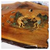 Kokepelli on varnished wood ready to tell time....