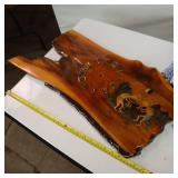 Kokepelli on varnished wood ready to tell time....