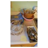 Silverware, Glass Baking Pans, Potholders, and Pink Pyrex Dish