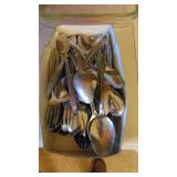 Silverware, Glass Baking Pans, Potholders, and Pink Pyrex Dish