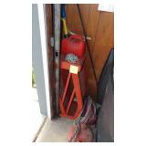 Contents of Corner of Garage, Car Ramps, Gas Cans, Jumper Cables and Chain
