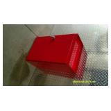 Red metal wall mount storage cabinet or first aid kit.