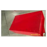 Red metal wall mount storage cabinet or first aid kit.