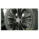 Four Chevrolet 5 lug wheels with newer Cooper tires. See description for tire sizes.