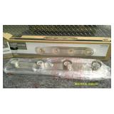 Four Light Vanity Fixture Brushed Nickel.