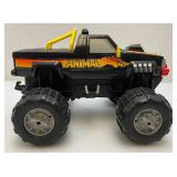 Two Toy Trucks Including Animal Monster Truck And Destroyer Army Truck