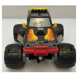 Two Toy Trucks Including Animal Monster Truck And Destroyer Army Truck