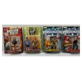 Misc. Wrestling Action Figures Including The Rock And More (NEW IN PACK)