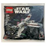 Misc. STAR WARS Action Figures And More (NIP) One In Protective Sleeve