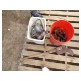 Orange Bucket with Content, White Garbage Can with Content