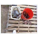 Orange Bucket with Content, White Garbage Can with Content