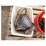 Orange Bucket with Content, White Garbage Can with Content