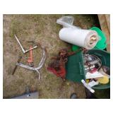 Pipe vise, Green Tote with content, roll of Plastic, Green Bucket