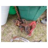 Pipe vise, Green Tote with content, roll of Plastic, Green Bucket