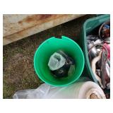 Pipe vise, Green Tote with content, roll of Plastic, Green Bucket