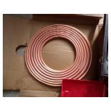 Roll of sopper tubing and fittings