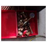 Roll of sopper tubing and fittings