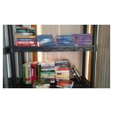 Covered Tote of Paperback, Hardcover Books.