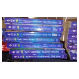 Covered Tote of Paperback, Hardcover Books.
