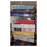Covered Tote of Paperback, Hardcover Books.