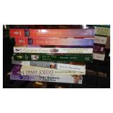 Covered Tote of Paperback, Hardcover Books.