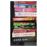 Covered Tote of Paperback, Hardcover Books.